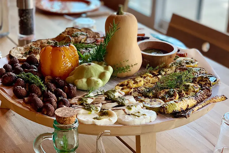 A harvest board of grilled vegetables from the farm