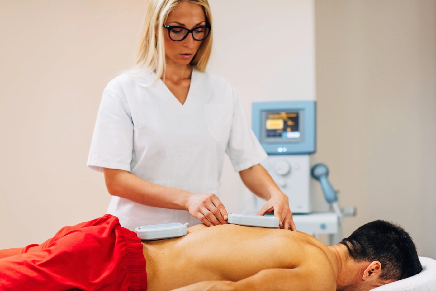 A practitioner guiding a PEMF session